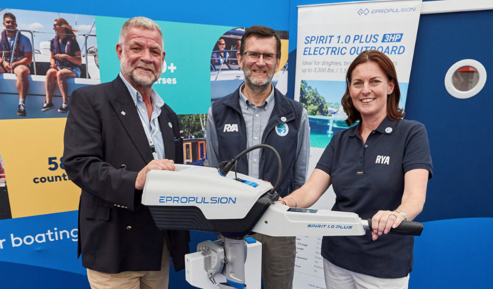 Steve Bruce, Phil Horton, RYA environment and sustainability manager and Sara Sutcliffe with ePropulsion’s Spirit Series electric outboard
