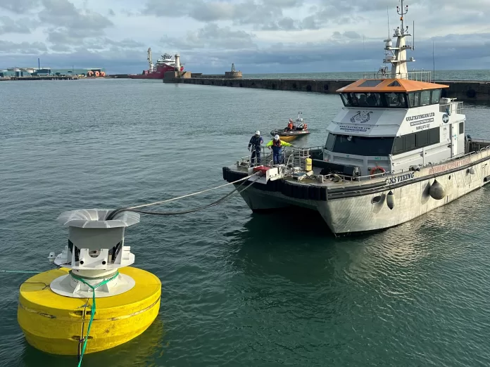The Oasis Power Buoy transferring power to the CTV GXS Viking in Peterhead Scotland